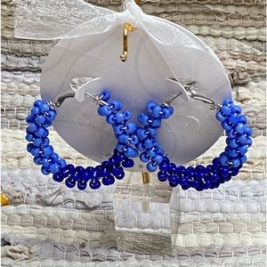 The blue earrings are called Gia